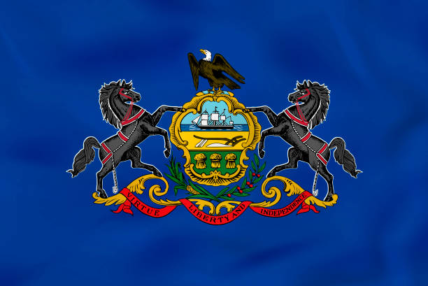 istock Pennsylvania waving flag. Pennsylvania state flag background texture. 1304854990