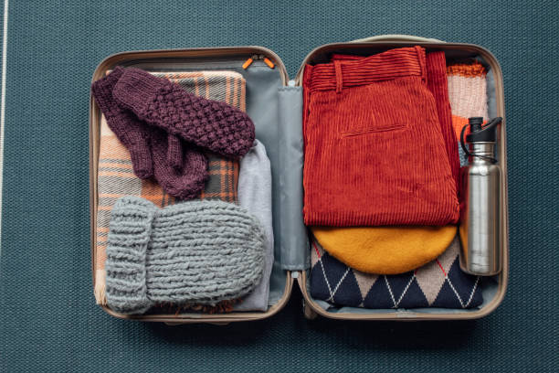 istock Winter Clothes in a Suitcase 1304857725