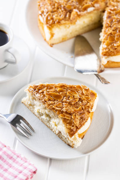 istock Sweet almond cake. Pie with cream and almonds. 1304858951