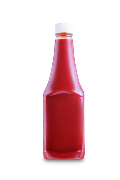 Fresh Ketchup sauce bottle on a white isolated background Fresh Ketchup sauce bottle on a white isolated background. toning. selective focus bottle of salad dressing stock pictures, royalty-free photos & images