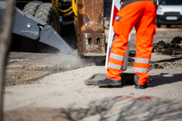 pracownik na budowie dróg, zespół ludzi w pracy - jackhammer road construction construction worker road zdjęcia i obrazy z banku zdjęć