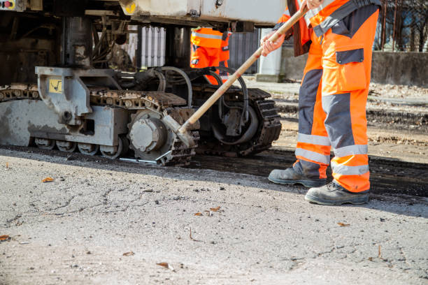 istock Worker on a road construction, team of people at work 1304861910