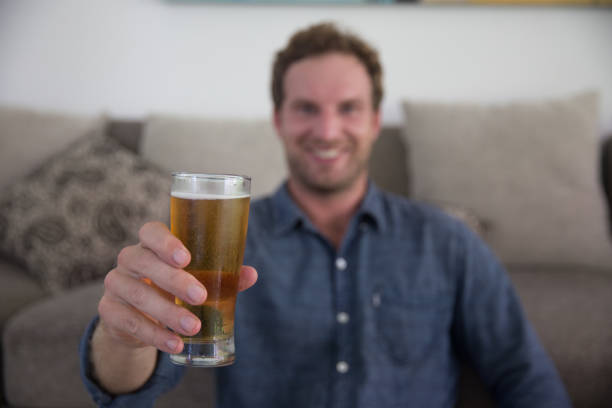 istock Deutsch Man Toasting a Glass of Beer 1304864584