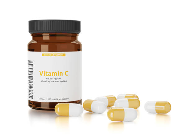 istock Vitamin C in a bottle isolated on white background 1304865520