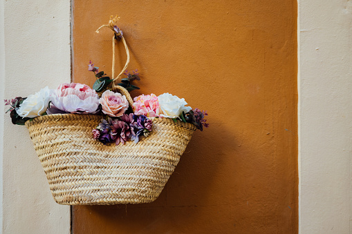 flower basket hanging on the wall
