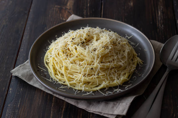 istock Roman pasta spaghetti with black pepper and cheese. Cacio e pepe. Recipes. Wine. 1304871376
