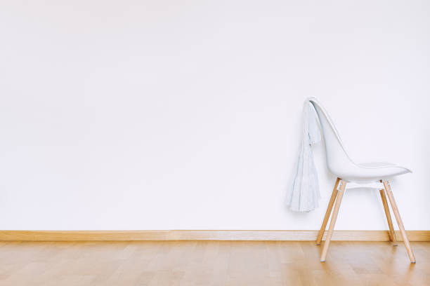 istock Indoors flat wall mockup with Clothes on Chair 1304871998