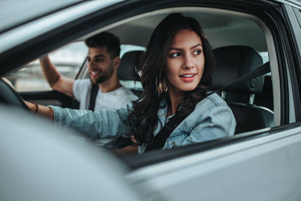 istock Young happy couple going on a road trip by car 1304873502