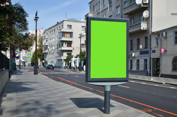 istock Blank citylight for advertising at the city on a sunny summer day, copyspace for text, image, design. 1304874829