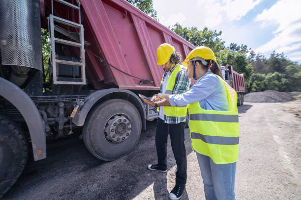 istock Construction Engineers working on a road construction site during COVID-19 pandemic. Social distancing and the new normal. 1304876004