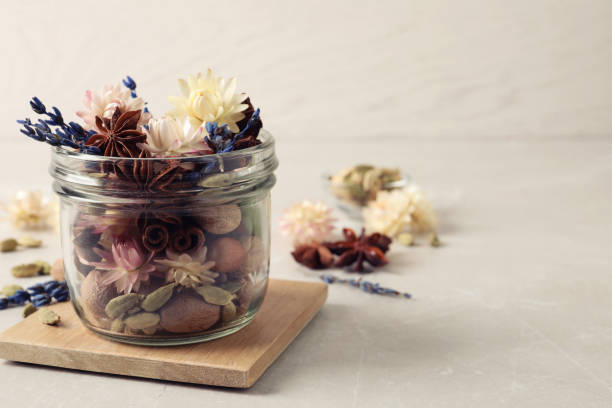 istock Aroma potpourri with different spices on white table, space for text 1304876435