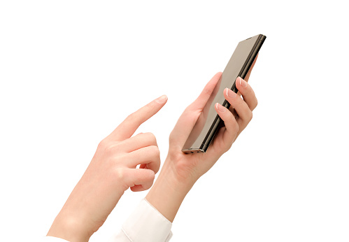 female hands in white shirt with smartphone on isolated white background