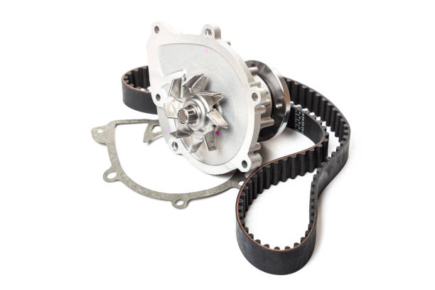 istock automatic water pump for car and belt isolated on white background. Automobile spare part 1304885950