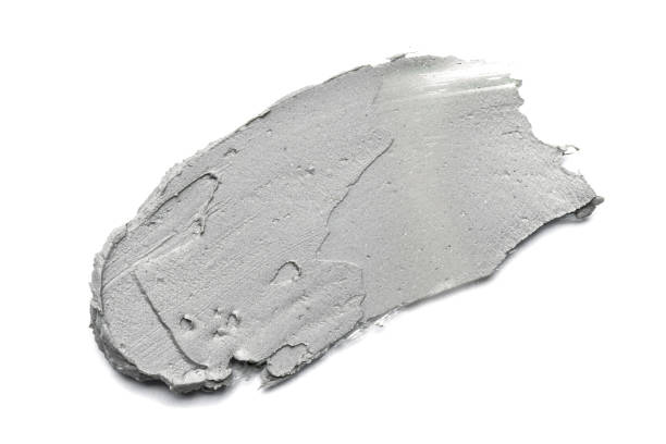 istock Smear of cosmetic clay on a white background. 1304887262