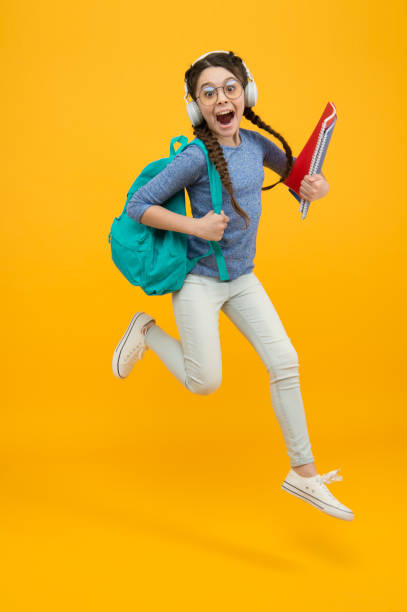 istock Inspired motivated schoolgirl. Knowledge day. Influence concept. Improve accessibility of education. Feel impact. Regular school day. Stylish schoolgirl. Girl carry backpack. Schoolgirl daily life 1304890246