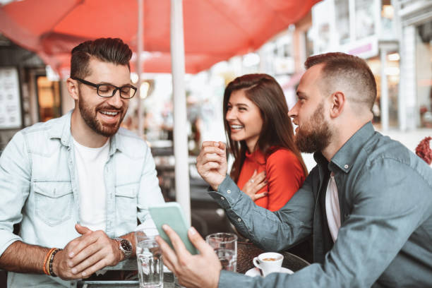 istock Coffee Time For Smiling Friends 1304890276