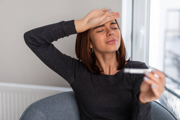 istock Sick woman with thermometer. Headache. Flu. Woman Caught Cold. Virus 1304893005