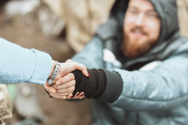 istock Offer A Helping Hand To The Poor And Homeless 1304893276