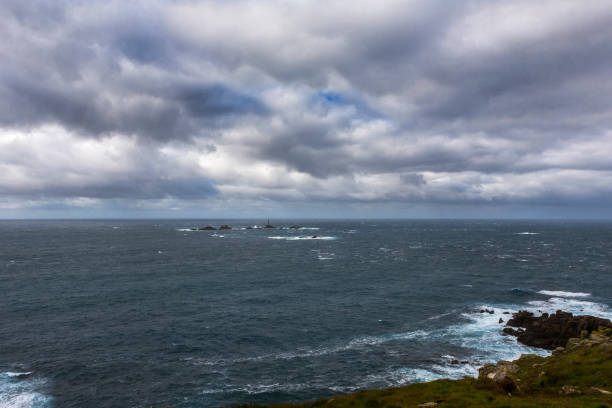 The Longships is the name given to a group of rocky islets situated approximately 1​1⁄4 miles (2 km) west of Land's End, Cornwall, United Kingdom. The islets are marked by the Longships Lighthouse, the current structure being first lit in December 1873.