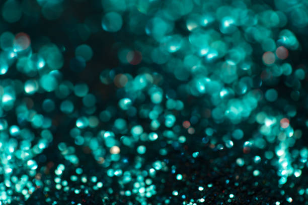 istock blue glitter background, christmas, underwater, ocean blue with bokeh 1304898392