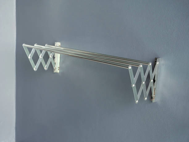 istock Aluminium folding clothes drying rack on the wall. 1304899565