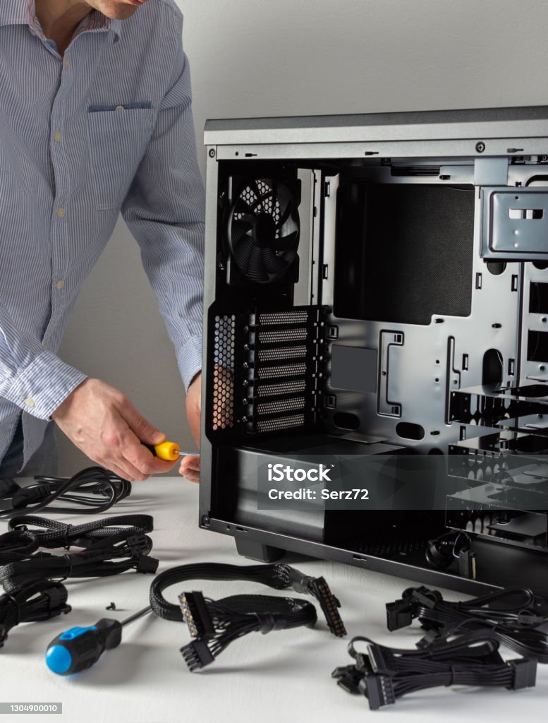 Computer System Unit Assembly Tools Male Master Assembles A New System Unit Stock Photo - Download Image ...