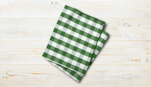 istock Napkin. Stack of colorful dish towels on white desk 1304900649