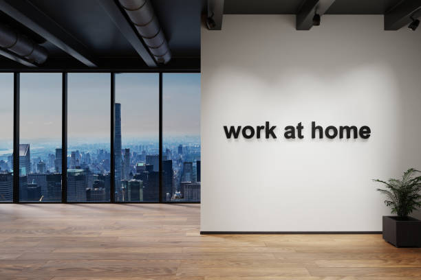 istock workplace and cozy couch side by side in large modern office building with skyline view; work at home conceptual; 3D Illustration 1304900738