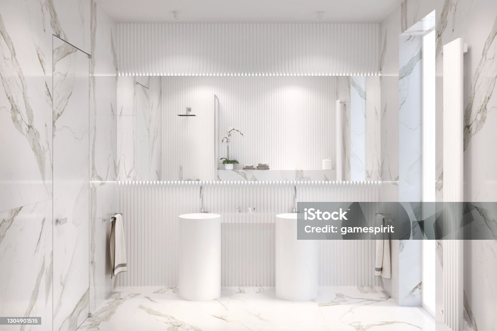 White bathroom with large rectangular mirror above two freestanding washbasins, shelf for bathroom accessories, towels, marble floor and walls, window and door, spotlights on the ceiling. 3d render Bathroom Stock Photo