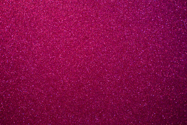 istock Glitter pink background.  Red and pink background with sparkling festive glitter 1304903648
