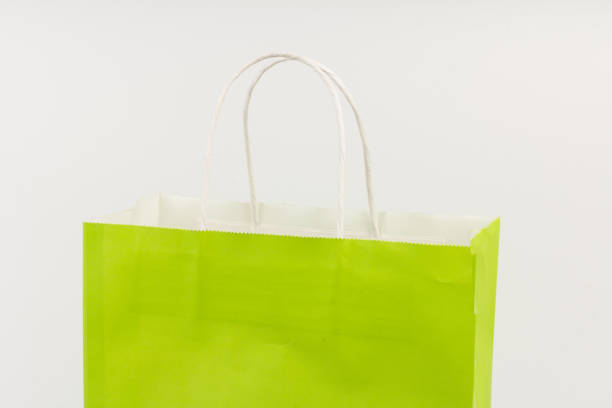 istock Bright gift bag isolated on white background 1304905590