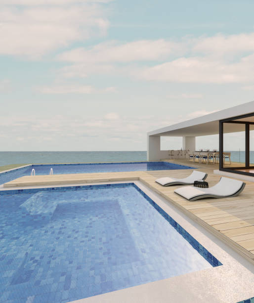 istock Modern house with a swimming pool, sea view 1304912416