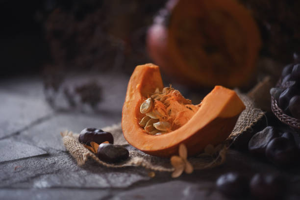 istock Pumpkin with chestnut at the kitchen table 1304913053