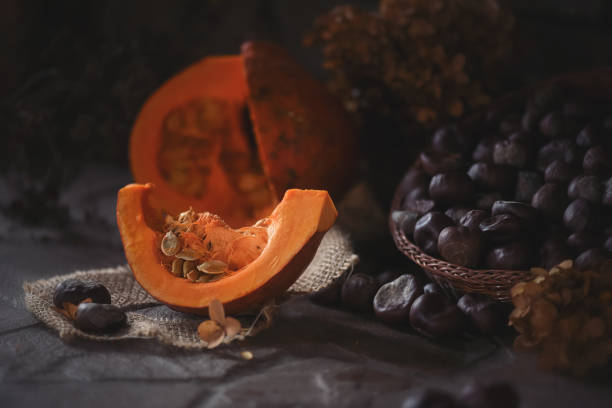 istock Pumpkin with chestnut at the kitchen table 1304913054