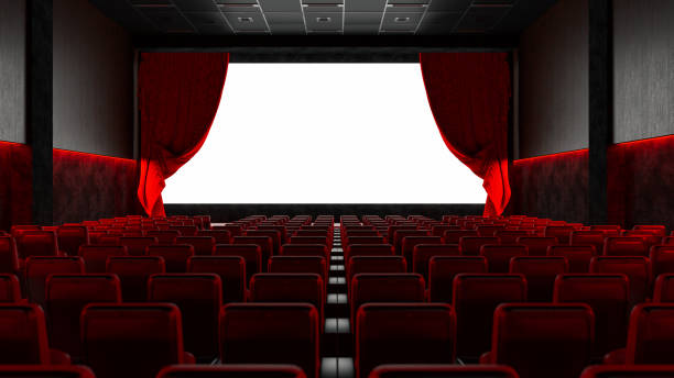 istock Empty Movie Theater with Red Seats and Blank Screen 1304913533