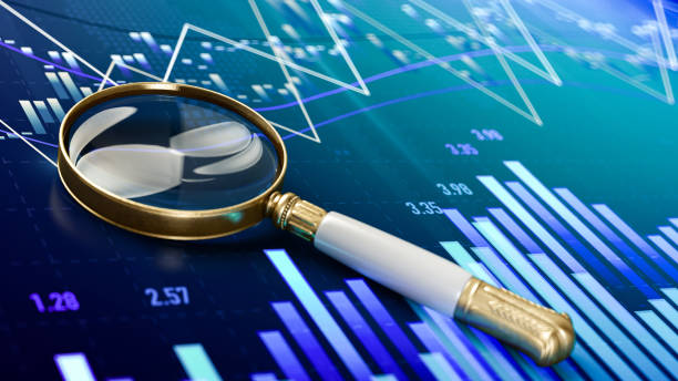 istock Magnifier Glass with Finance Chart 1304913835