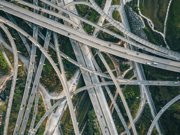 istock Aerial View of Complex Overpass and Busy Traffic 1304916806