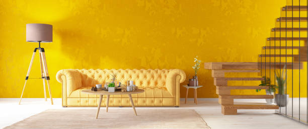 istock Modern Yellow Interior with Stairs and Chesterfield Sofa 1304919665