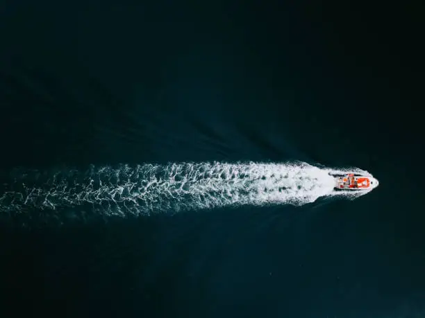 Photo of Fishing boat coming back to the harbor