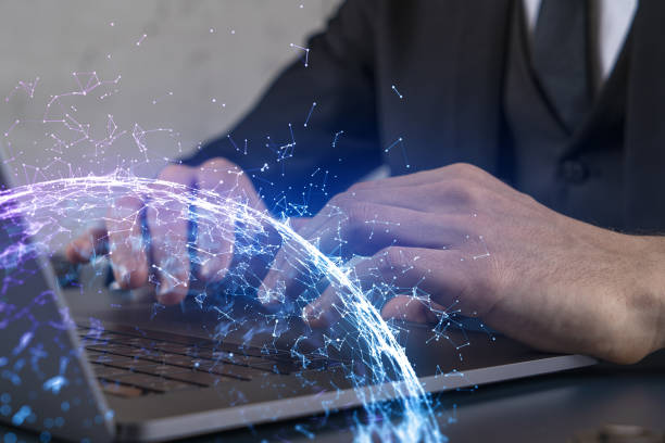 istock Businessman search for tech solutions options, typing laptop background and abstract technology hologram. 1304926218