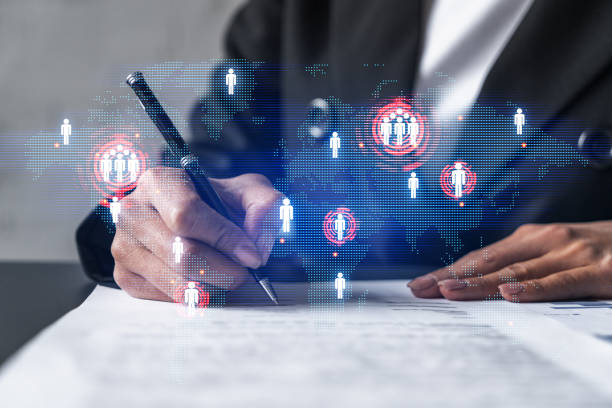 istock World map and a woman signing papers. Double exposure. 1304926297