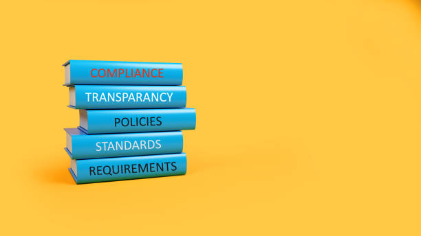 istock Blue books listed under compliance on blue background 1304927367