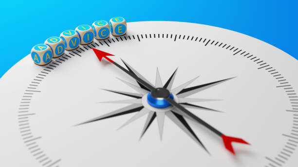 istock Blue colored blocks with advice text and compass on blue colored background 1304929936