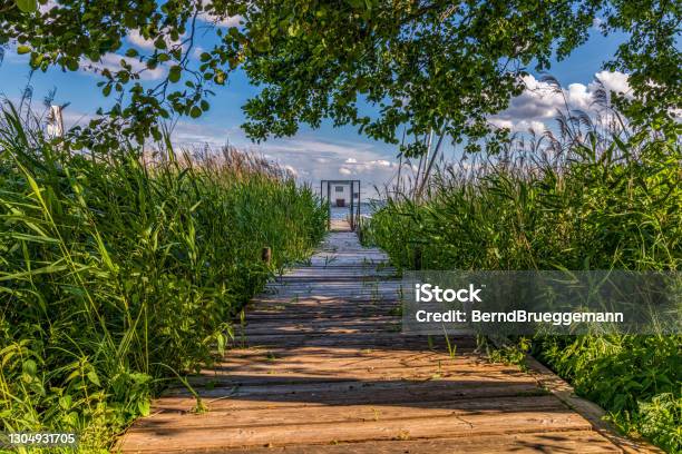 A Jetty With A Closed Gate Seen In Mardorf Lower Saxony Germany Stock Photo - Download Image Now