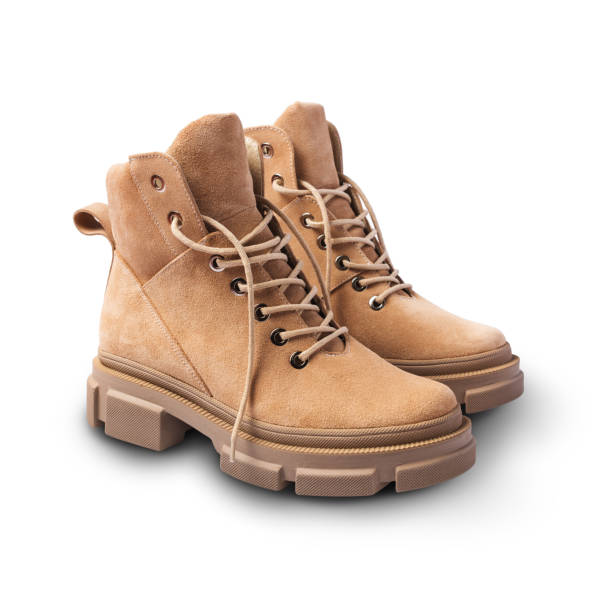 istock Beige leather boots on laces for street style 1304935500