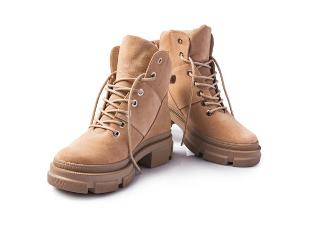 istock Beige leather boots on laces for street style 1304935691