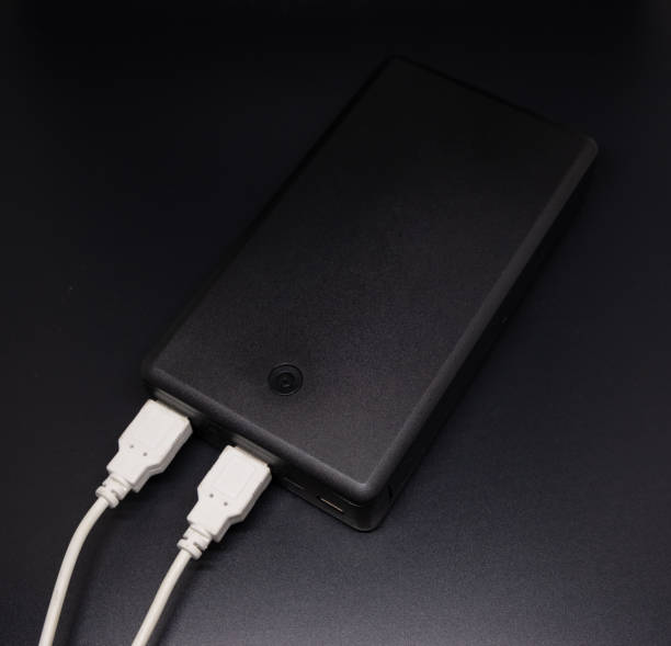 istock black power bank energy on black Color gradation. Space for your text. 1304936436
