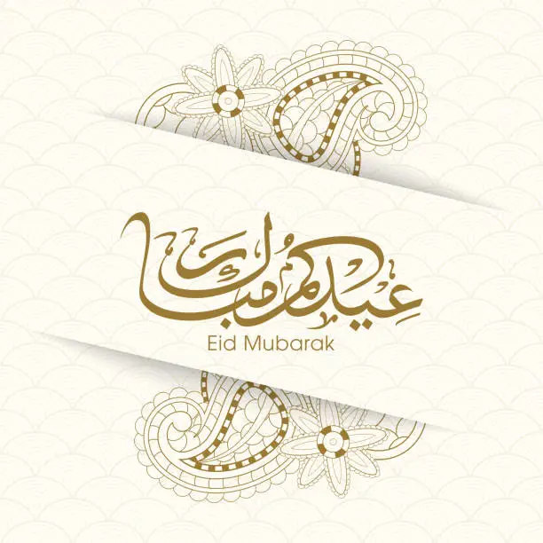 Vector illustration of Arabic Calligraphic text of Eid Kum Mubarak for the Muslim community festival celebration.