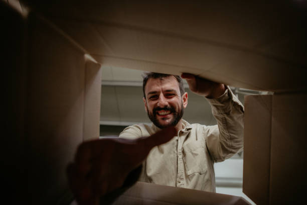 istock Taking out of the box a gift 1304937872