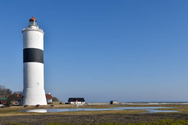 istock Springtime by the lighthouse at Ottenby in Sweden 1304941313